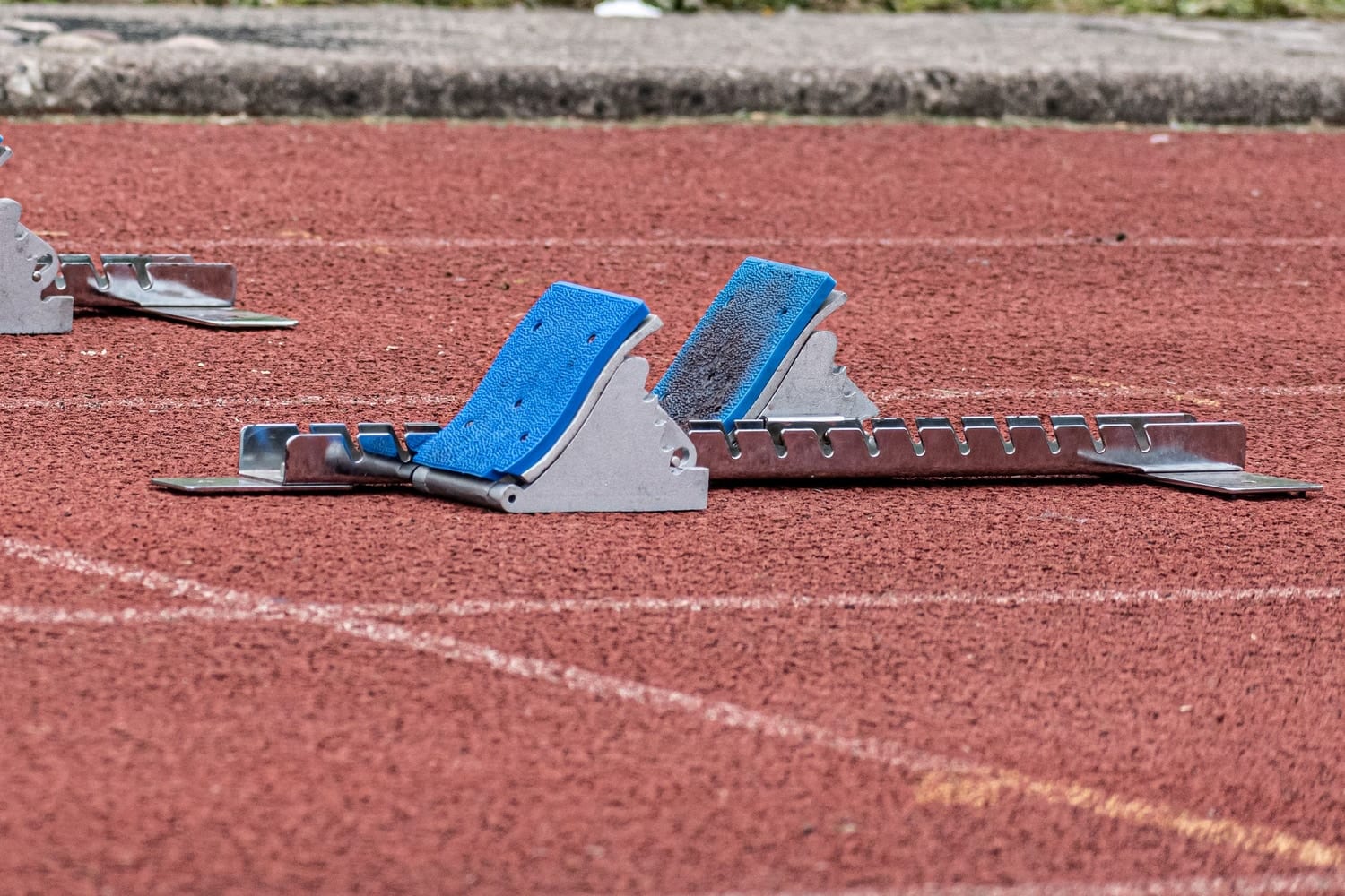 Starting blocks set on a running track